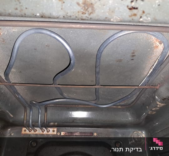 גוף חימום חשמלי בתנור אפייה ישן